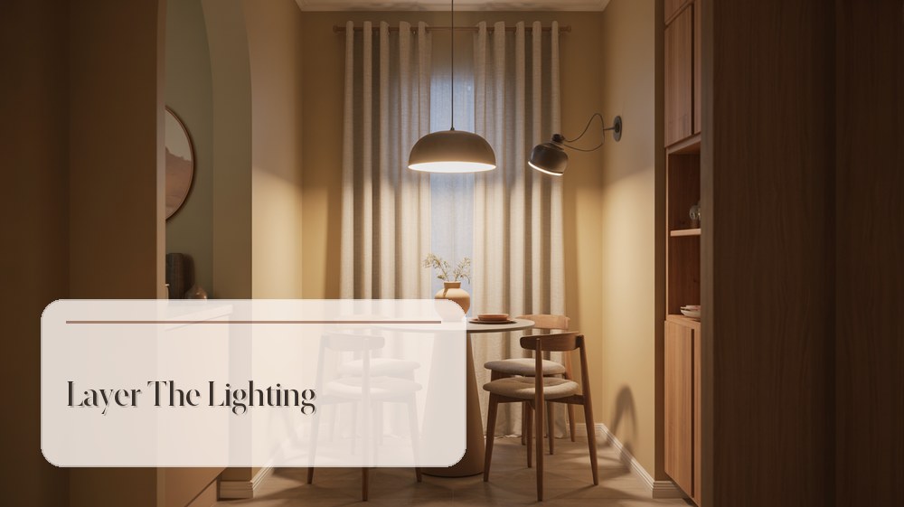 Small dining nook lit by a pendant light, wall sconce, and soft table lamp glow